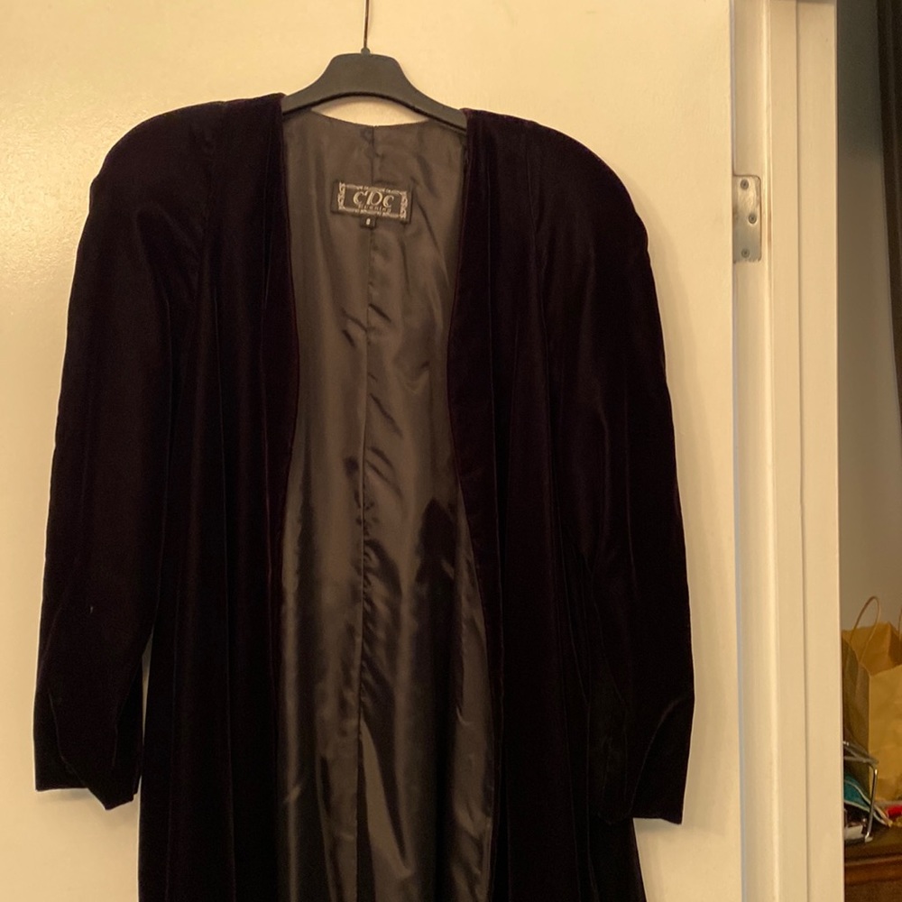 Dressy black velvet open front jacket.